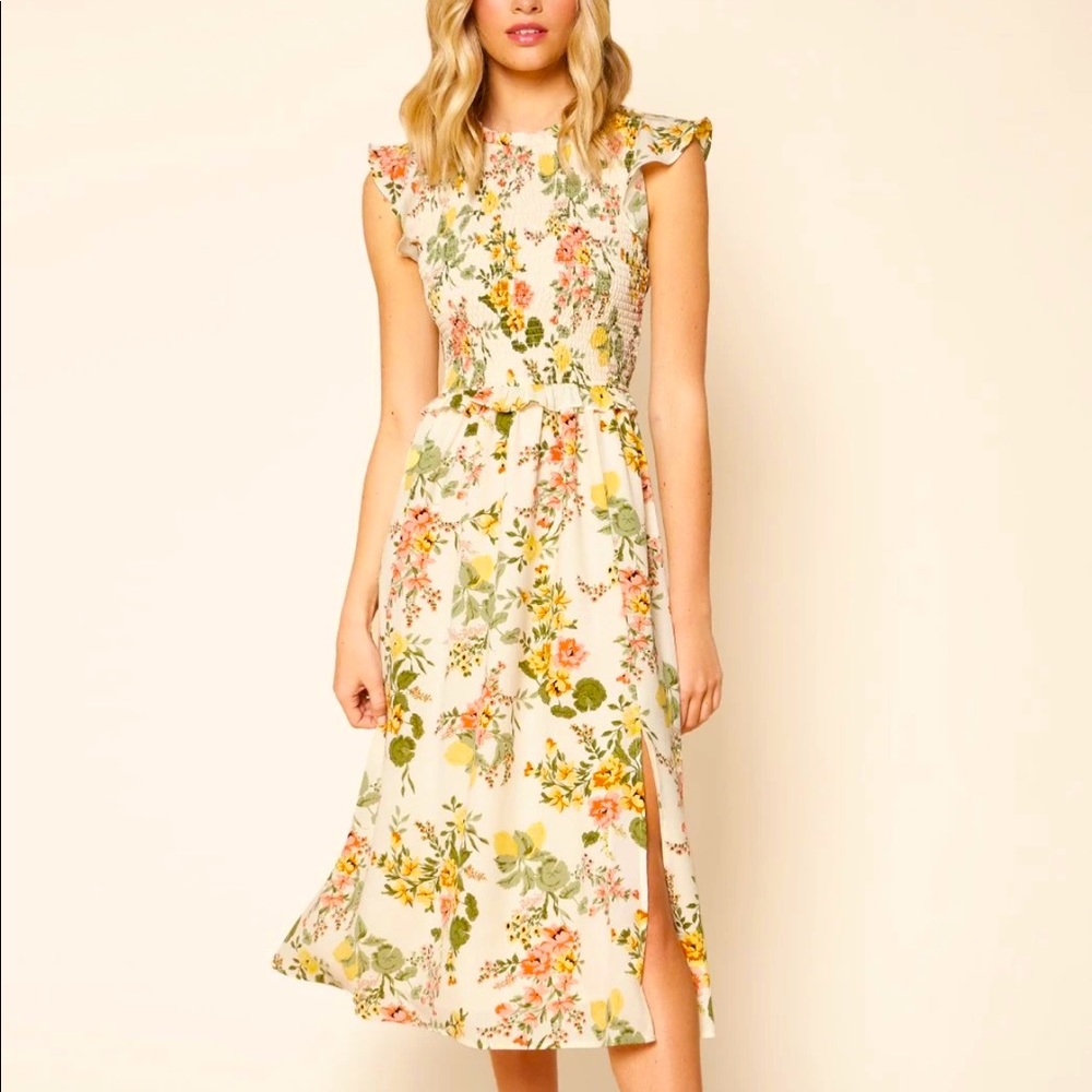 Femme and floral, this pretty midi dress